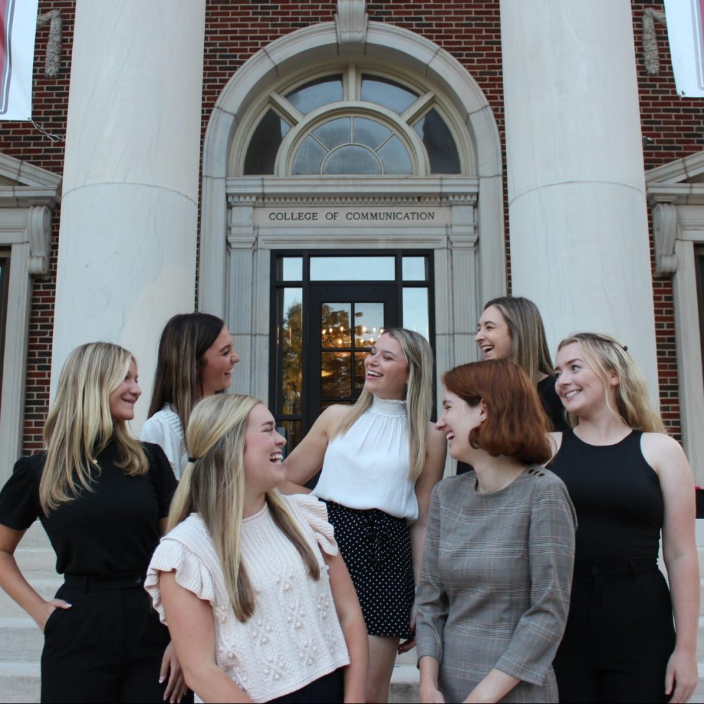 The PRSSA 2023 board poses together in front of Reese Phifer Hall at The University of Alabama
