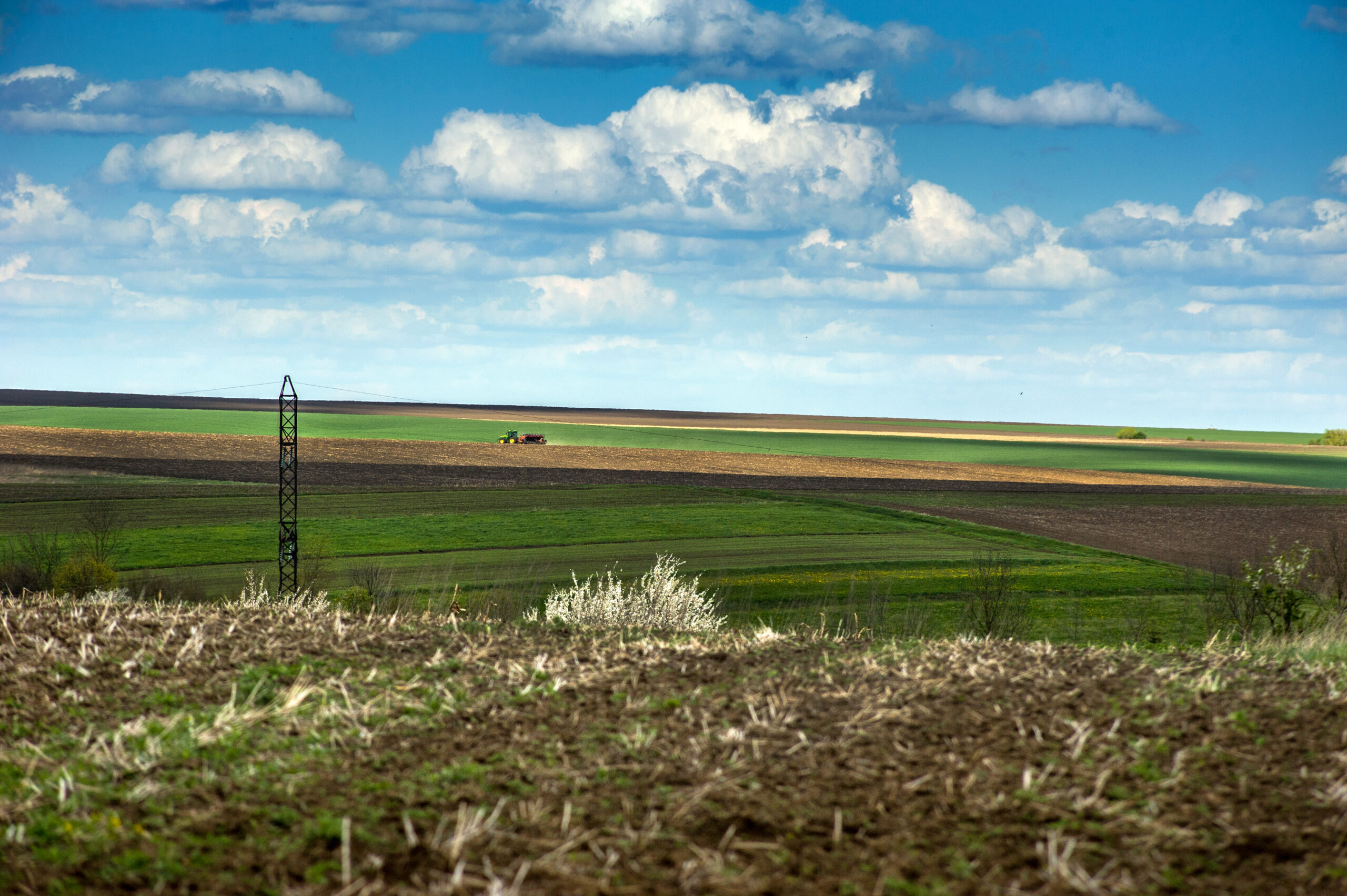 Spring fields plowed soil and rural landscape