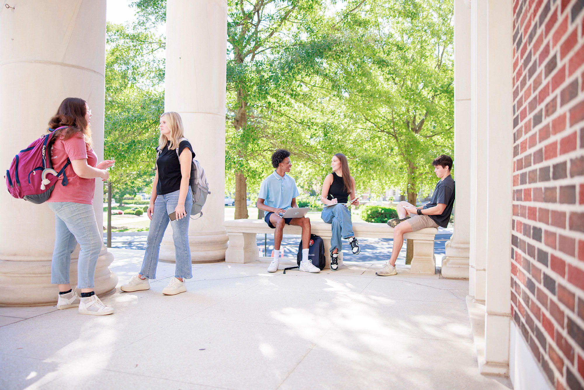 students on the front porch of Reese Phifer